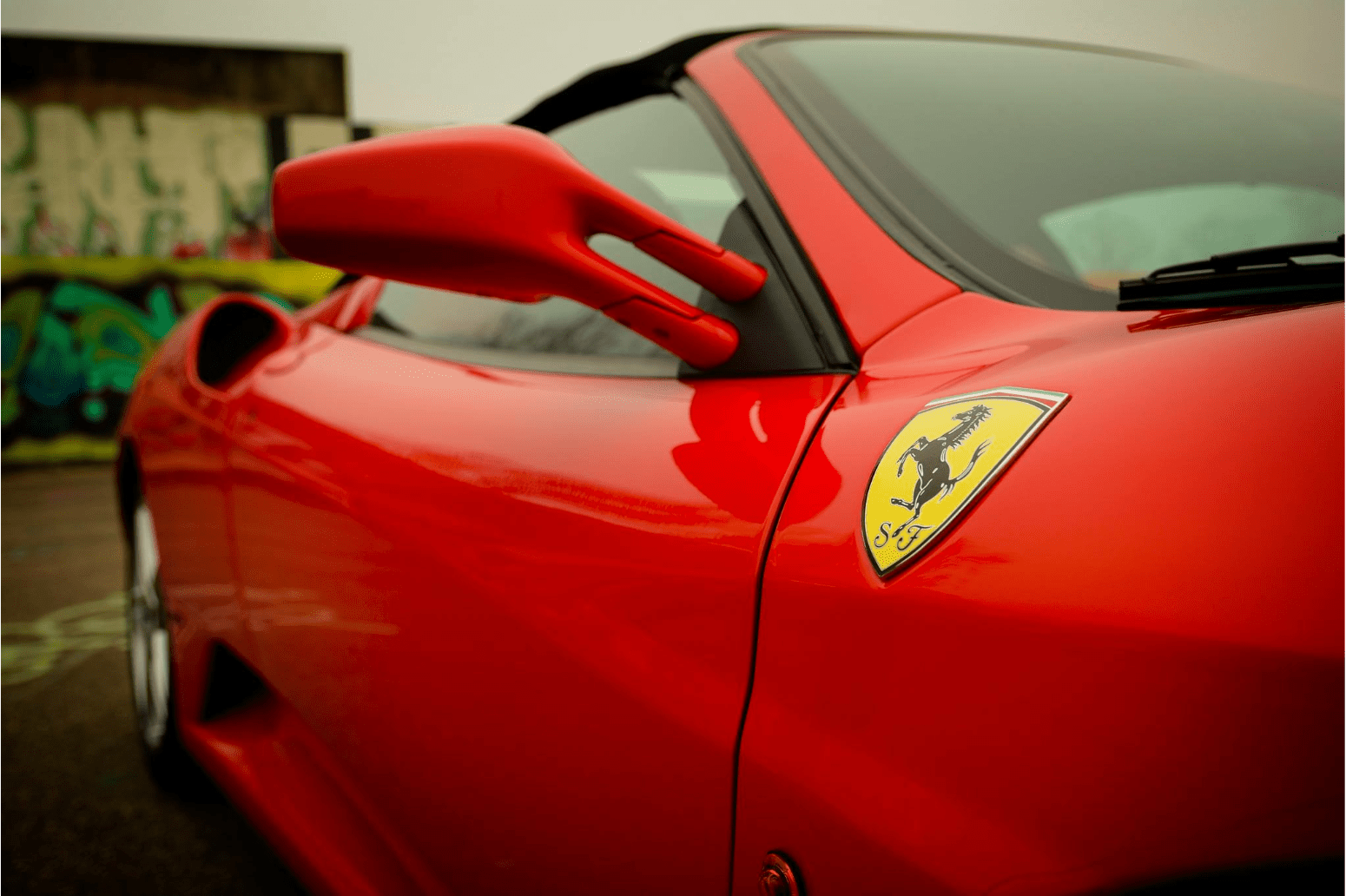 a close up of a red car